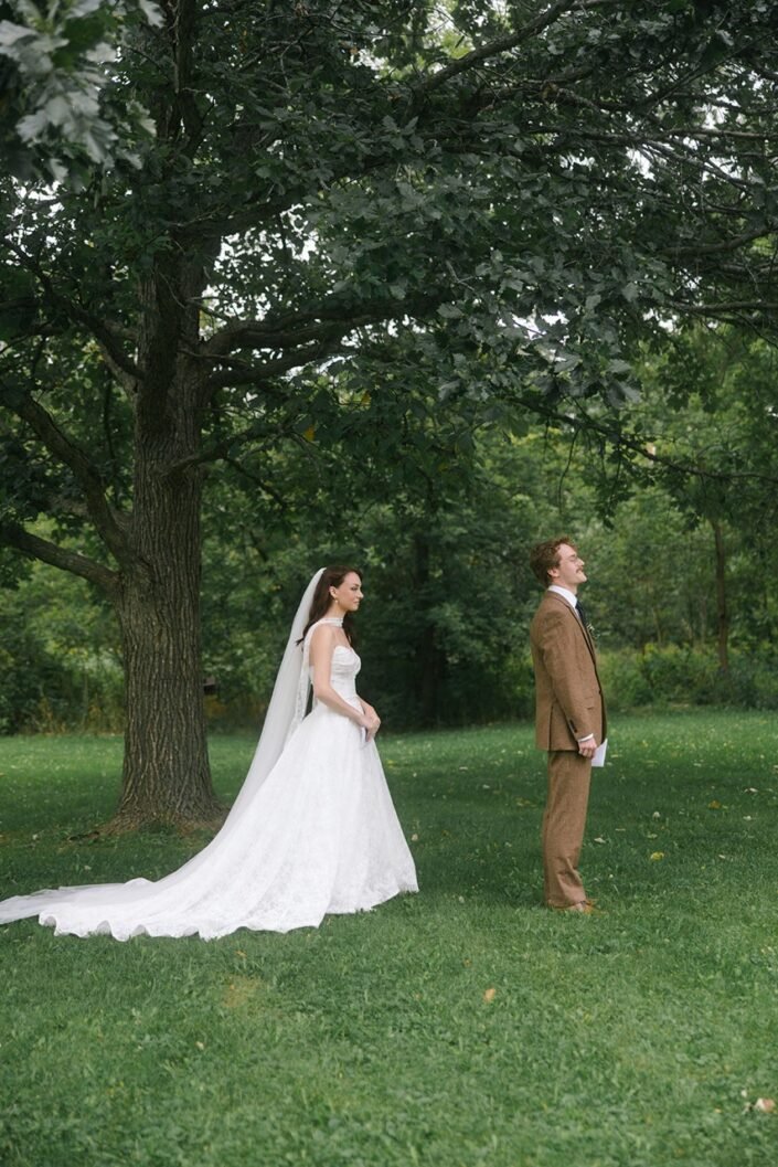 Shannon and John seeing each other during their first look before the wedding ceremony.