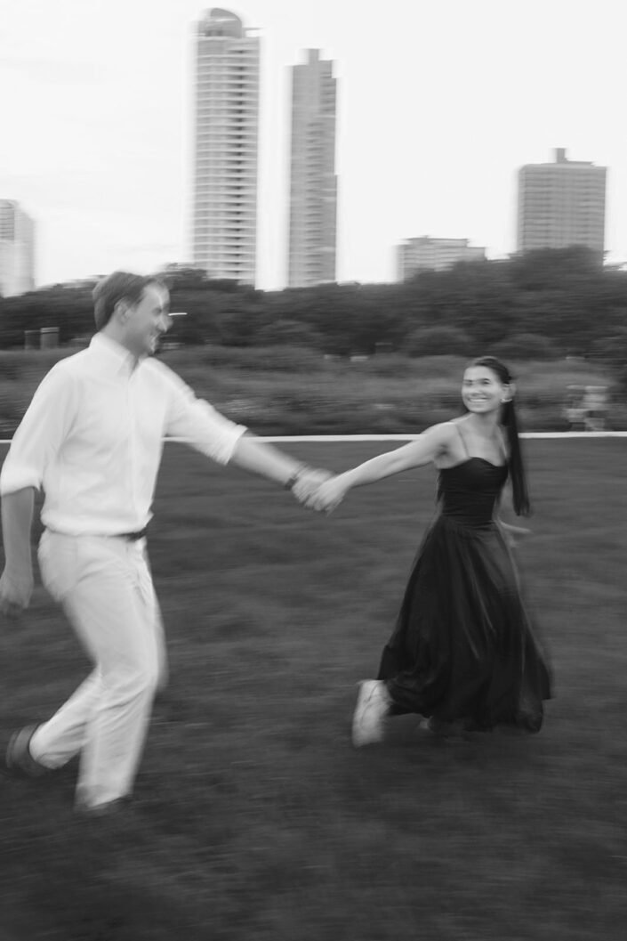 Darya and Charlie walking together after their Milwaukee surprise proposal