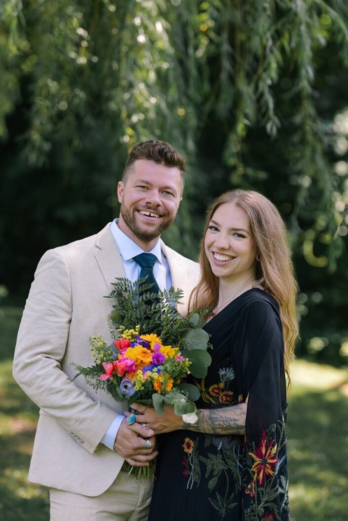 Adam and Claire laughing together during their Milwaukee WI elopement